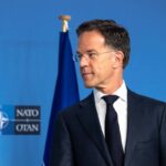 Mark Rutte y Donald Trump en reunión de la OTAN discutiendo estrategia contra Irán